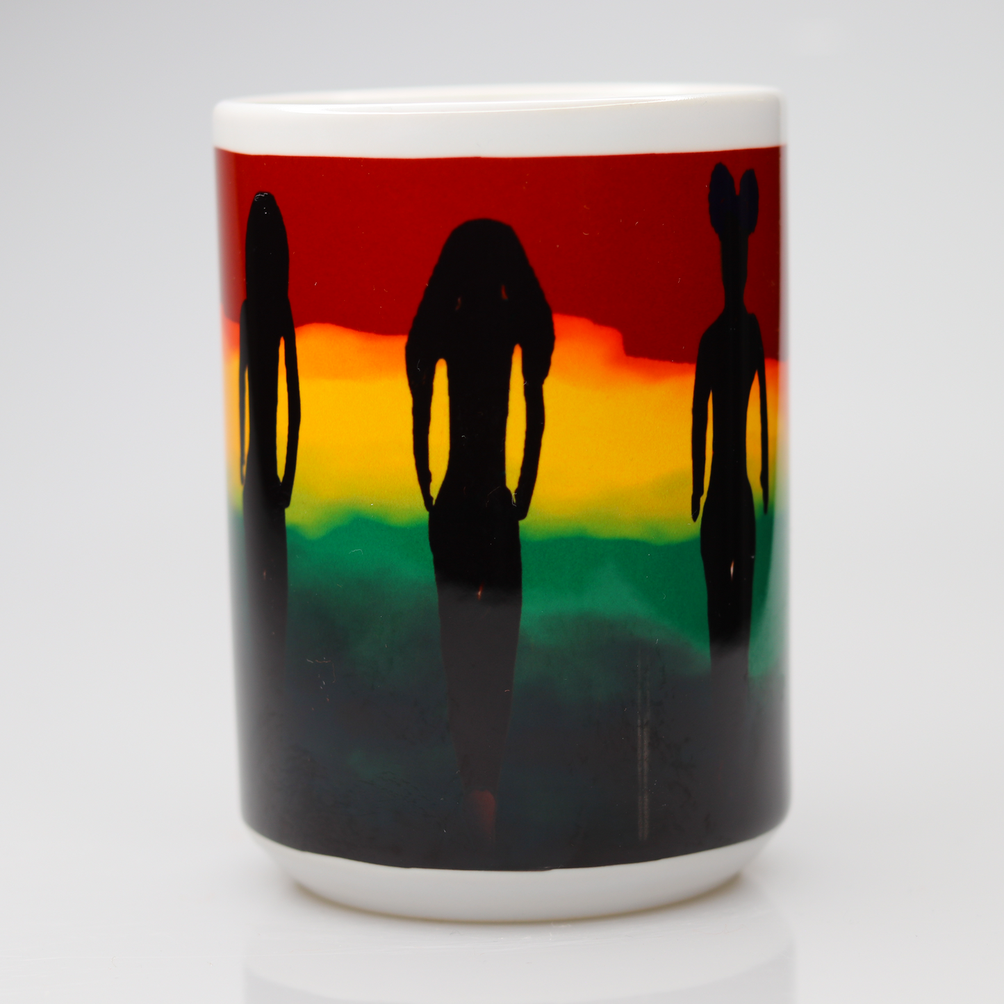 CC15 350 African American women in black silhouette walking through red, black, green and yellow clouds.