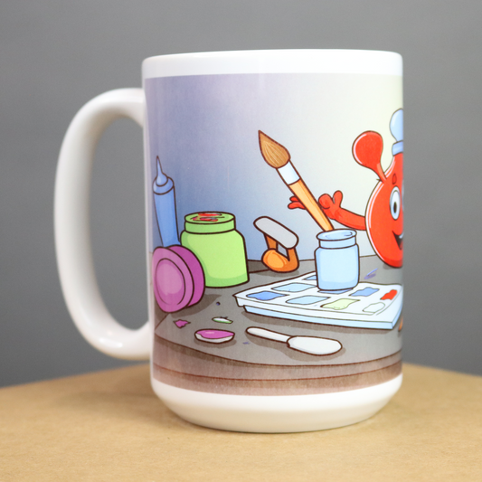 Mug with cartoon art teacher  painting on a table, on a gray background