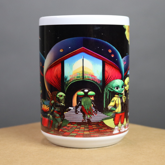 Colorful mug with alien design on a black, red, green and yellow background